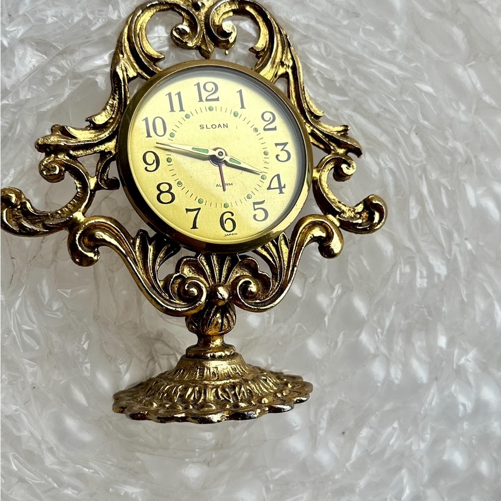 Vintage Gold Ornate Wall Clock with Intricate Scrollwork